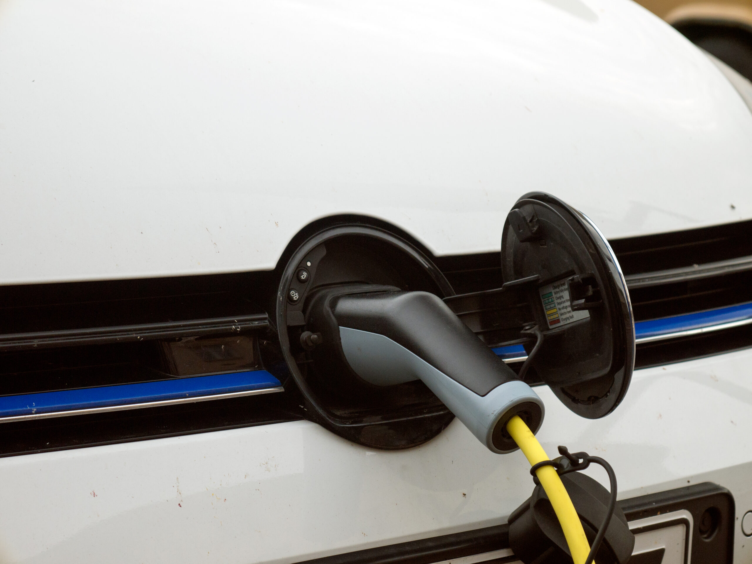 White,Electric,Car,Charging