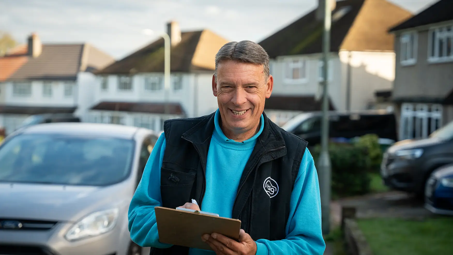 Big Wants Your Car team member evaluating a car